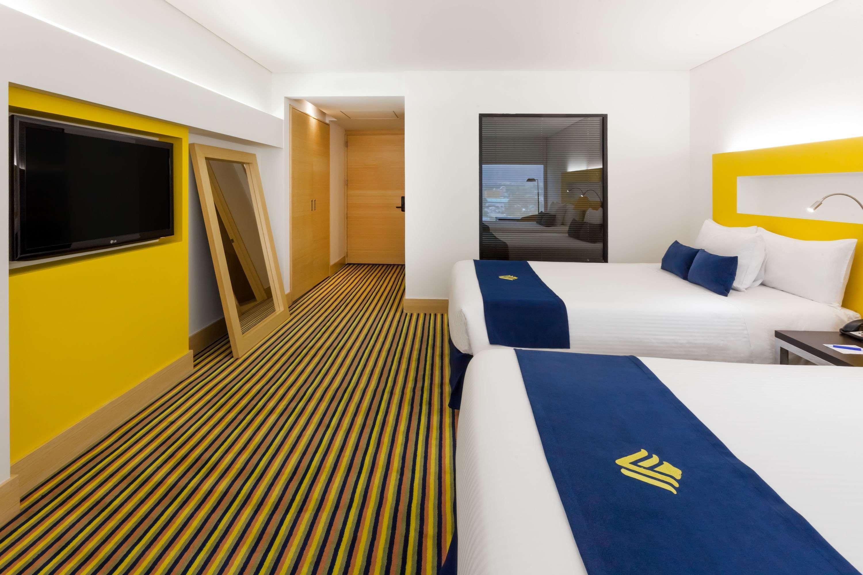 Wyndham Bogota Hotel Exterior photo A room at the hotel